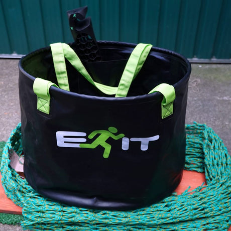 EXIT BUX Wetsuit Changing Bucket in use