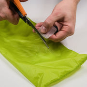 Gear Aid Tenacious Tape Silnylon Tent Patches being cut to size