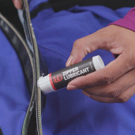 Gear Aid Zipper Lubricant Stick applied to zipper